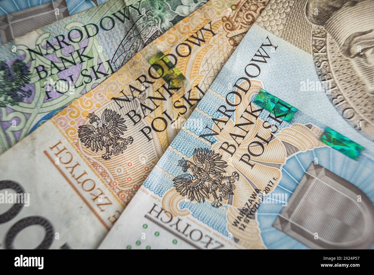 La banca Narodowy Polski firma sul concetto di inflazione Banknote Economy in Polonia Foto Stock