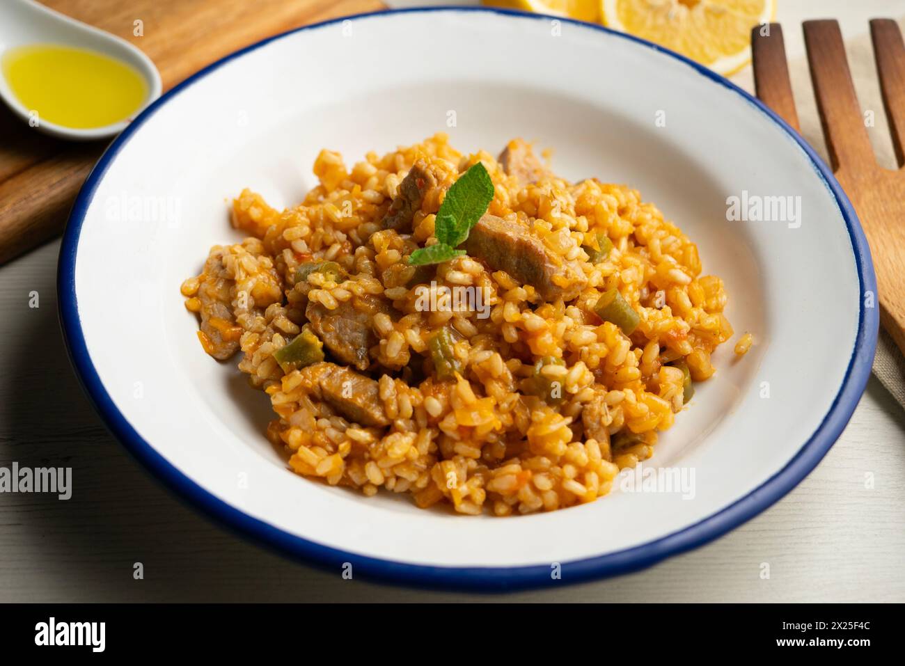 Paella di riso spagnolo con lombo di maiale iberico Foto Stock
