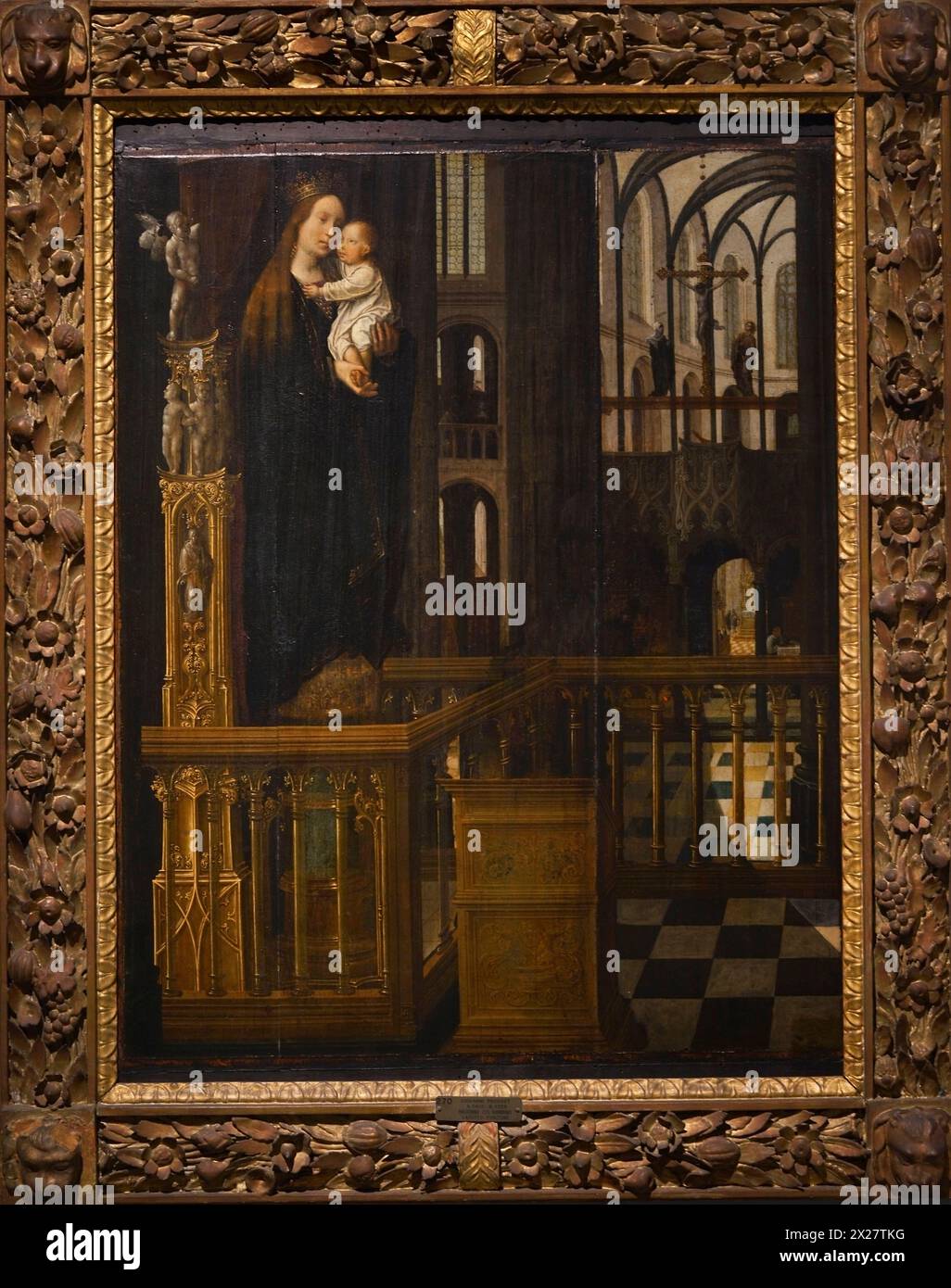 Jan Provost (1465-1529). Pittore fiammingo. Madonna col bambino su un piedistallo all'interno della navata di una chiesa gotica. Olio sul pannello. Museo civico ala Ponzone. Cremona. Italia. Foto Stock