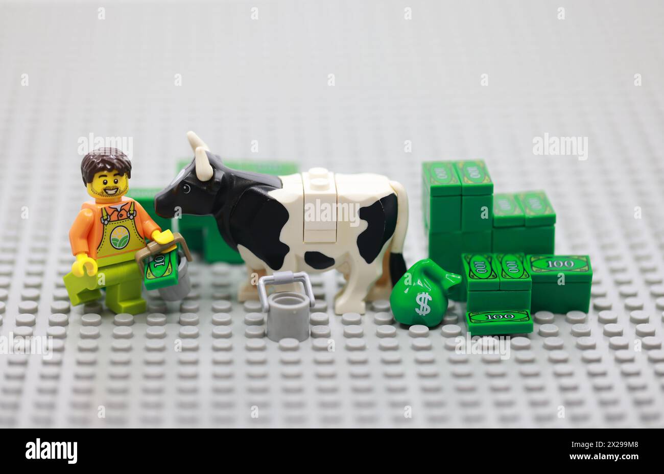 L'agricoltore fa soldi con Cash Cow Foto Stock