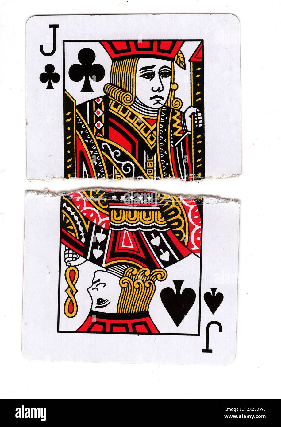Strappate metà di carte da gioco vintage che mostrano un jack di mazze e picche su sfondo bianco. Foto Stock