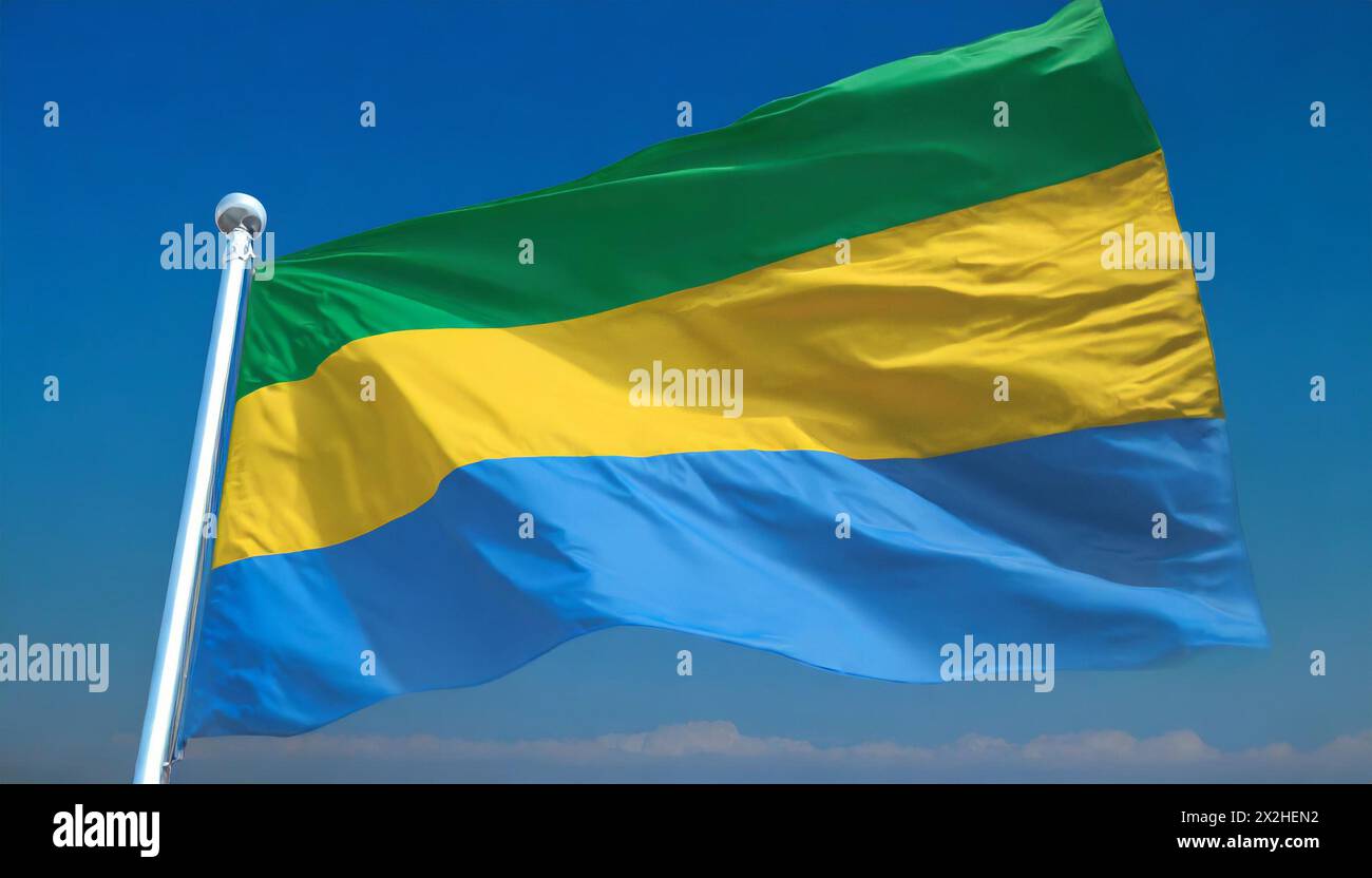 Die Fahne von Gabun flattert im Wind, isoliert gegen blauer Himmel Foto Stock