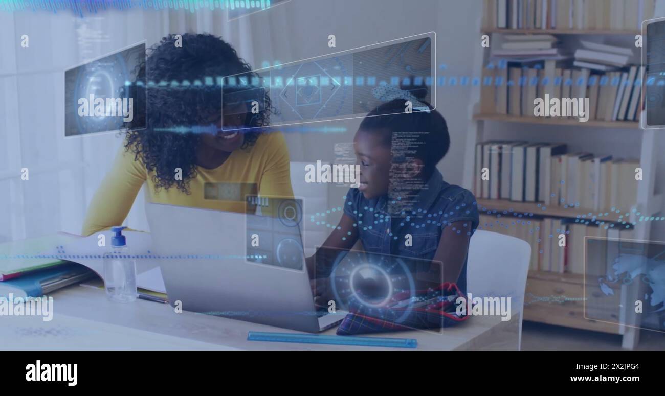 Immagine di dati su madre e figlia afroamericana felici che usano il laptop per i compiti scolastici Foto Stock