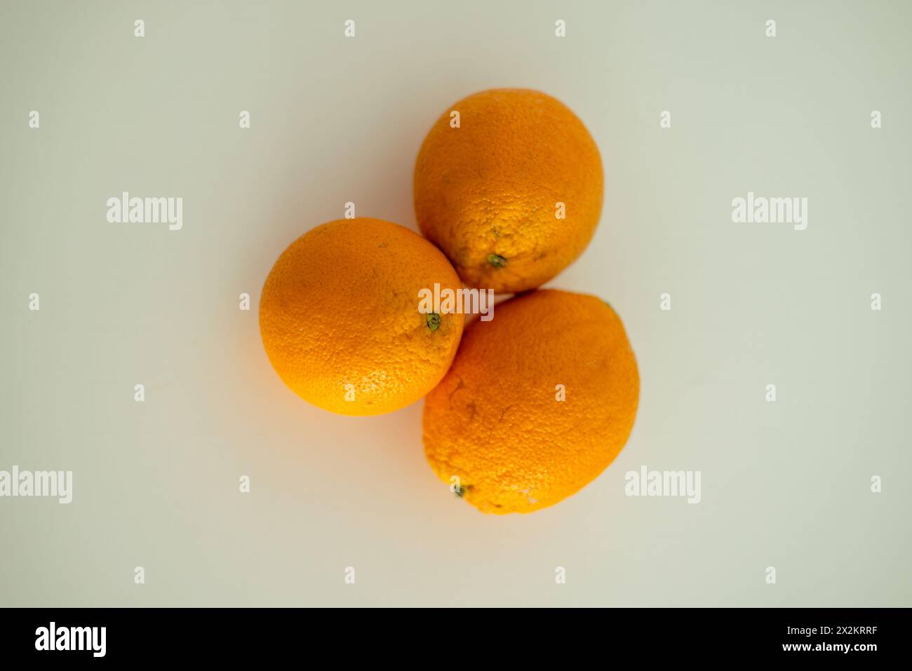 tre arance Foto Stock