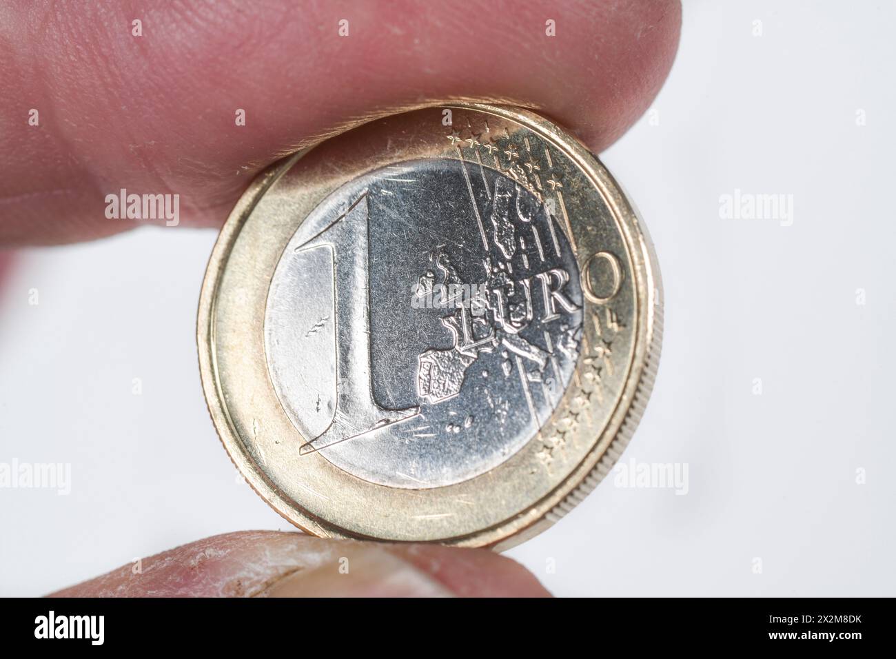 Geld, Hand, Münze, 1 Euro, Symbolfoto Foto Stock