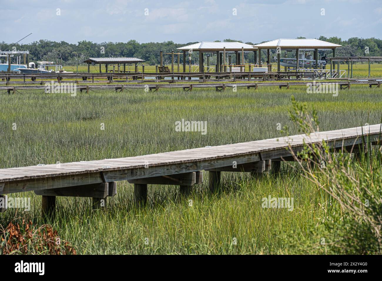 Le barche mareali attraccano lungo Egans Creek sull'isola Amelia a Fernandina Beach, Florida. (USA) Foto Stock