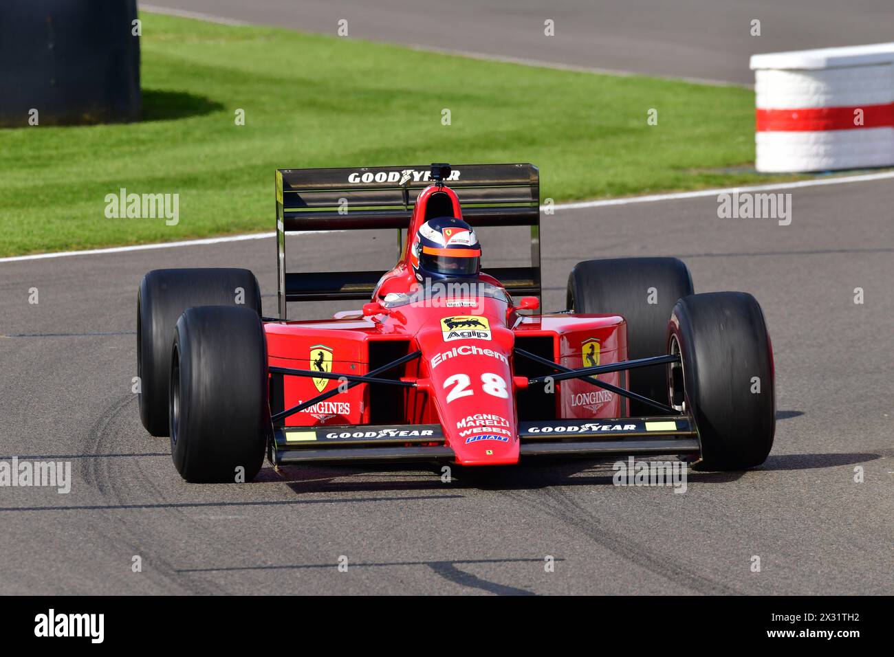 Gerhard Berger nella V12 motorizzò la Ferrari 640 che guidò nel campionato di Formula 1 1989, vincendo in Portogallo, Goodwood 81st Members Meeting, Go Foto Stock