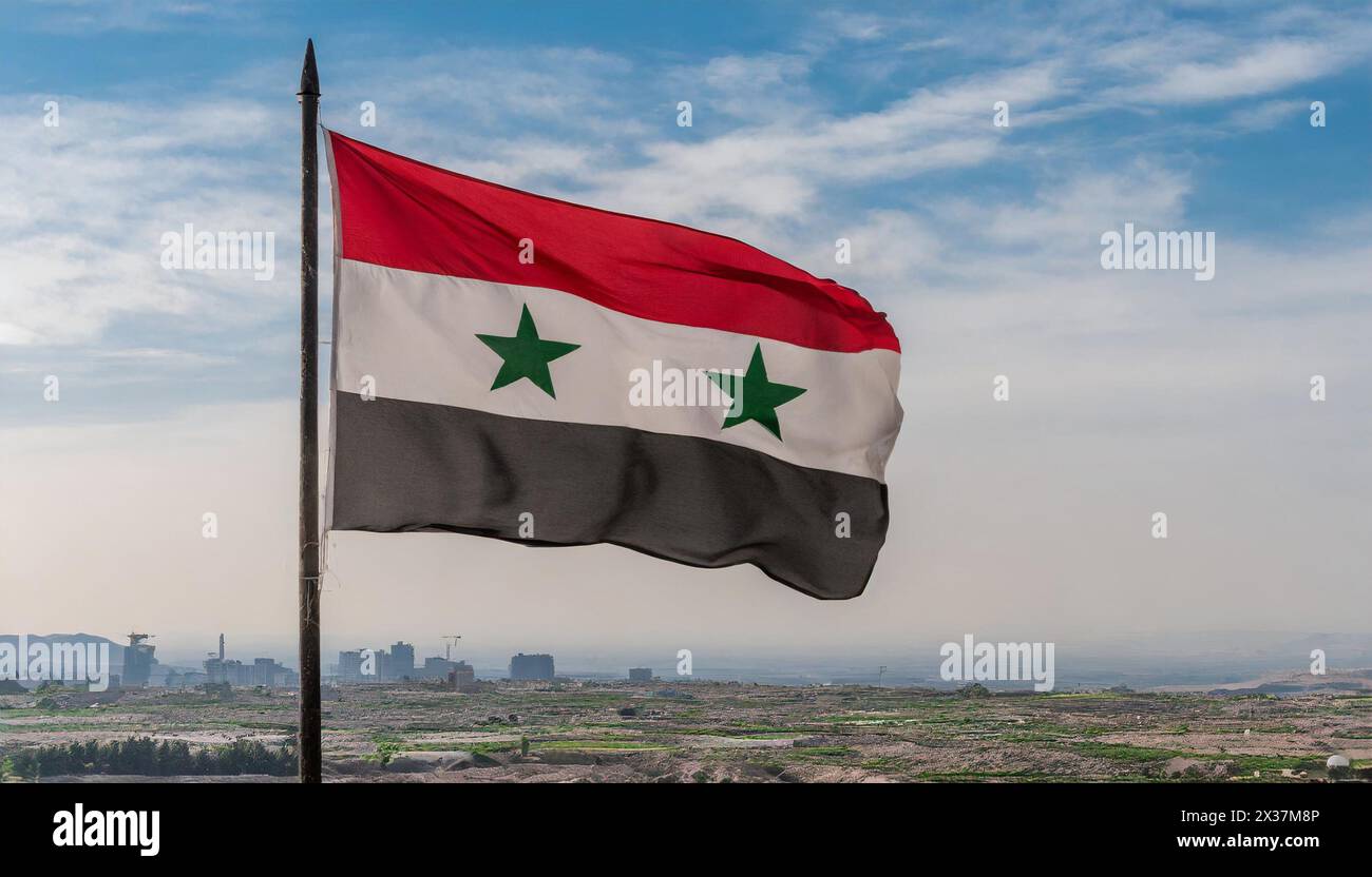 Die Fahne von Syrien flattert im Wind Foto Stock