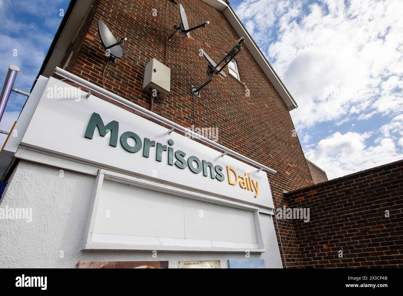 Morrisons Daily - un minimarket gestito dal supermercato Morrisons come alternativa al tradizionale negozio all'angolo. Slade Green, Kent, Regno Unito Foto Stock