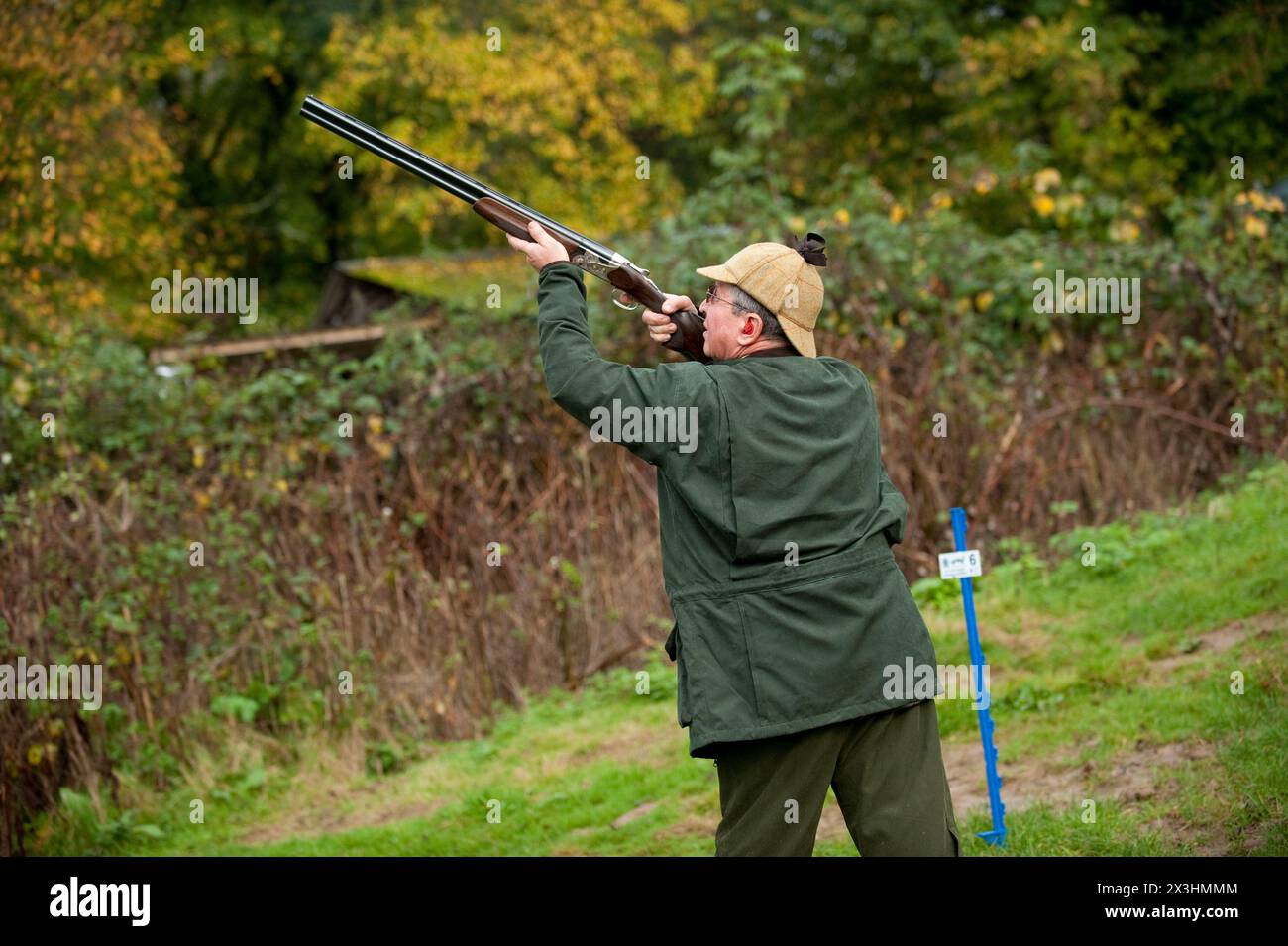 Uomo fagiani di ripresa Foto Stock