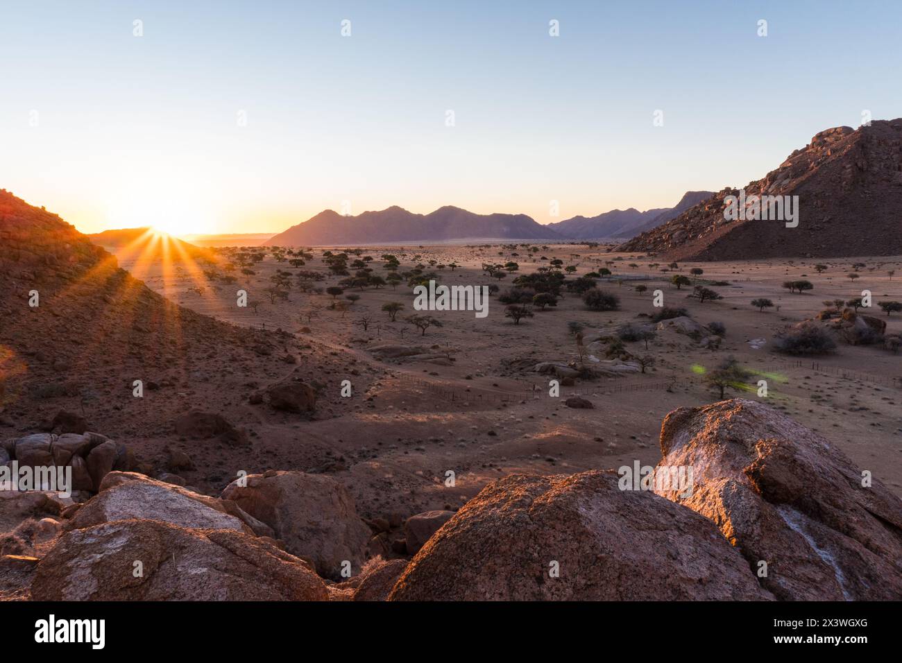 Tramonto nel deserto del Namib (Monti Tiras), Namibia Foto Stock