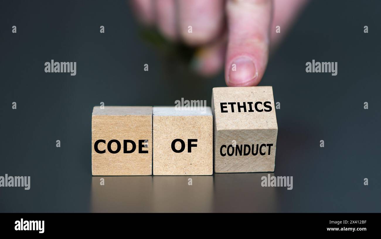 I cubi formano l'espressione "codice di condotta" e "codice etico". Foto Stock