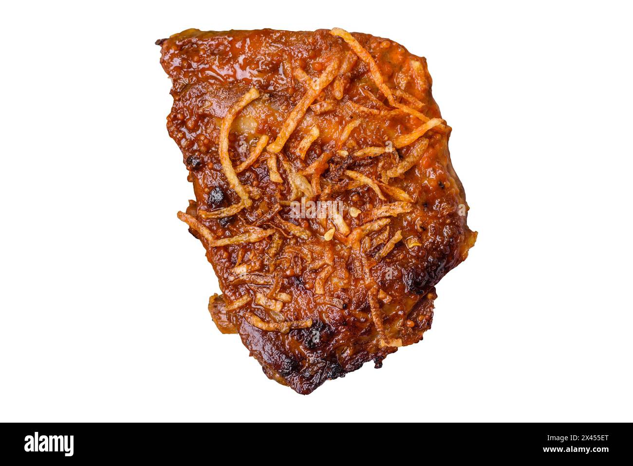 Deliziose costolette di maiale o di manzo cotte alla griglia con sale, spezie ed erbe aromatiche su fondo di cemento scuro Foto Stock