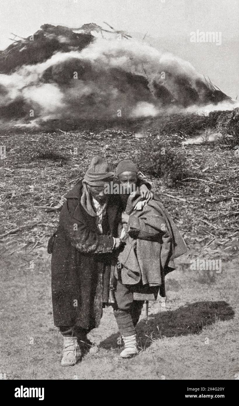 Due turchi feriti in fuga da un villaggio attaccato dalle forze bulgare durante la prima guerra balcanica, 1912. Da Mundo grafico, pubblicato nel 1912. Foto Stock