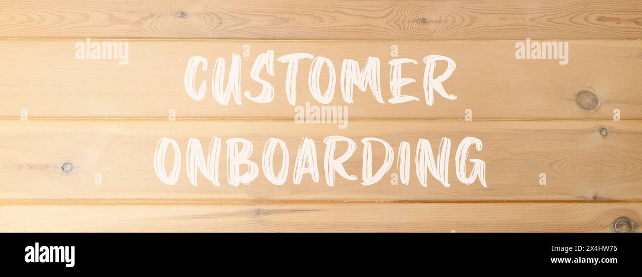 Simbolo di onboarding del cliente. Parole concettuali onboarding del cliente su una bella parete di legno. Bellissimo sfondo in legno. Onboarding dei clienti aziendali Foto Stock