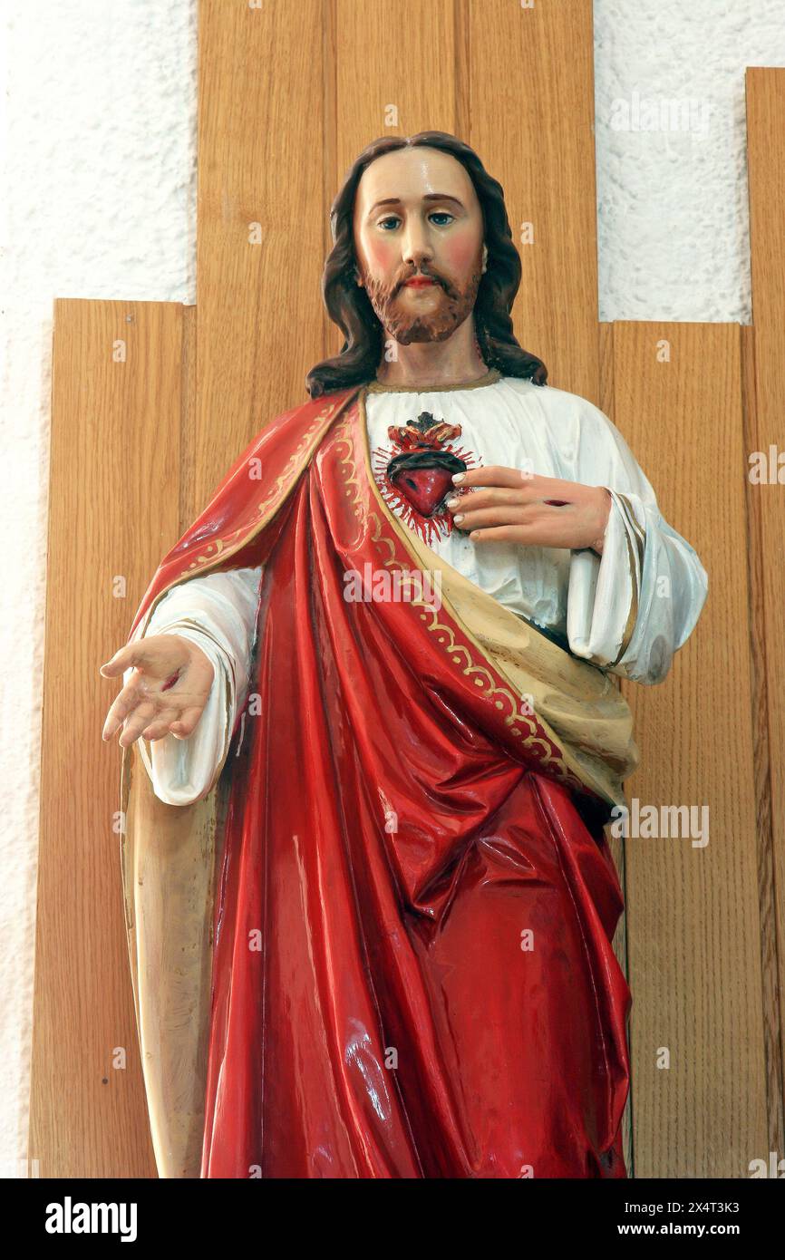 Sacro cuore di Gesù, statua nella chiesa parrocchiale di San Massimiliano Kolbe a Bijenik, Zagabria Croazia Foto Stock