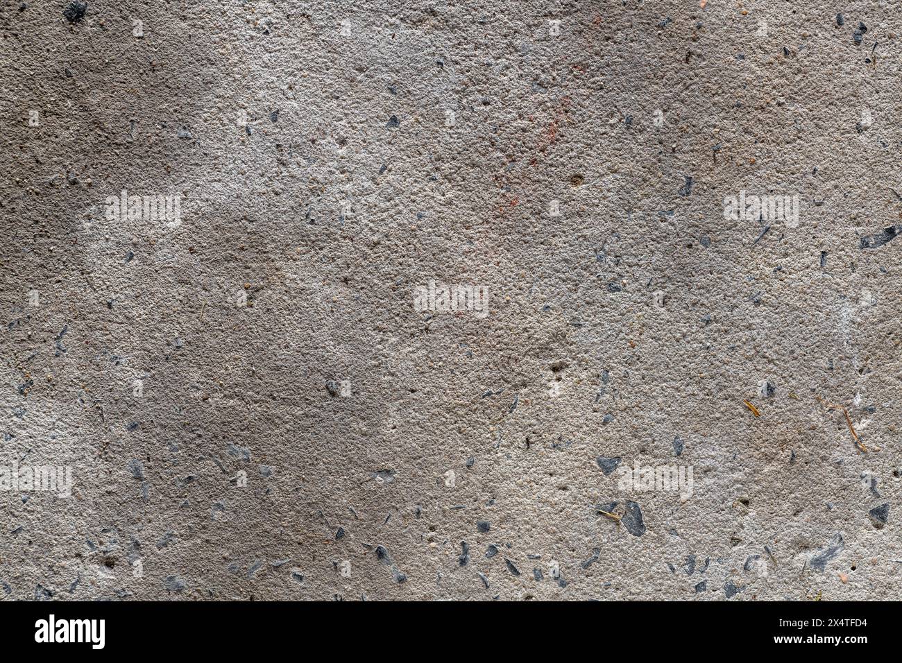 Struttura di fondo in cemento. Primo piano di un vecchio pavimento o di un muro in cemento grigio. Foto Stock