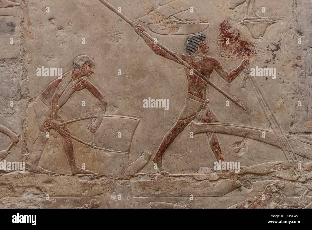 Rilievo scolpito sul muro del complesso funerario di Djoser nella necropoli di Saqqara, in Egitto. 2635 e 2606 a.C. Pescatori. Foto Stock