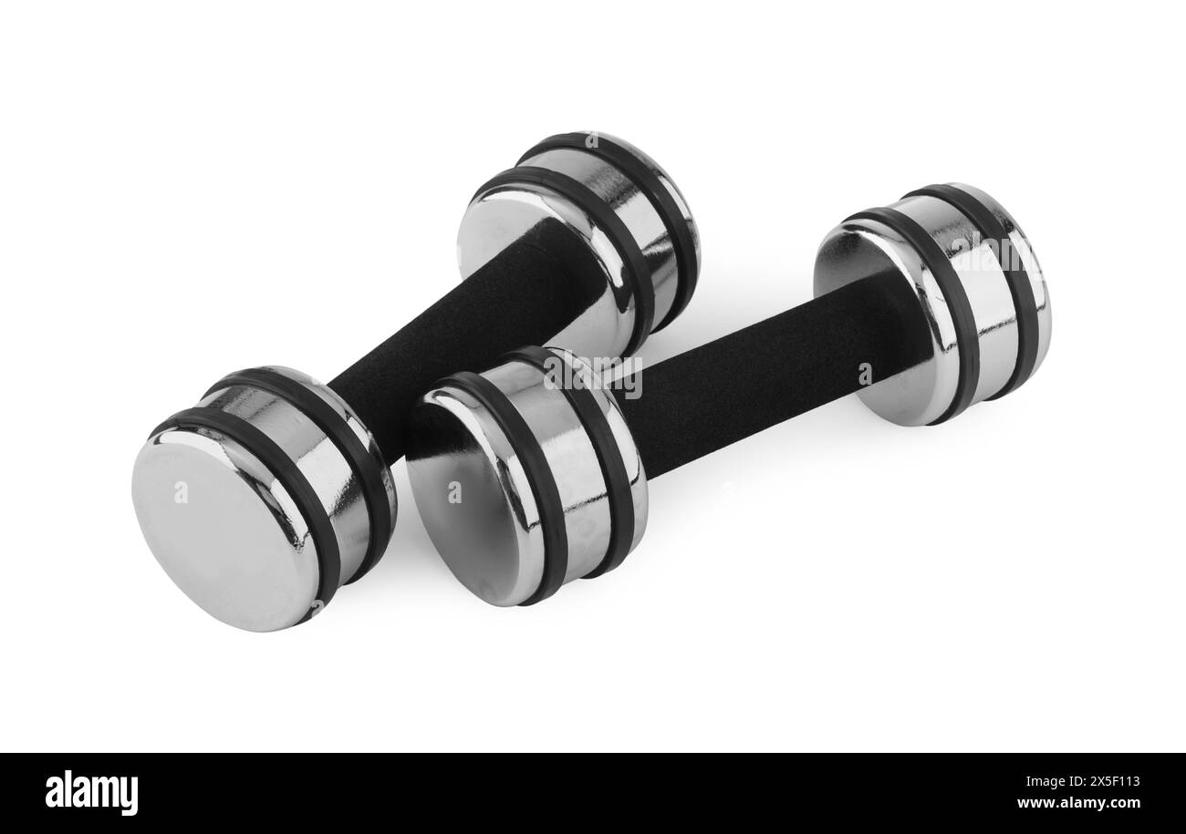 Manubri in metallo isolati su bianco. Attrezzature sportive Foto Stock
