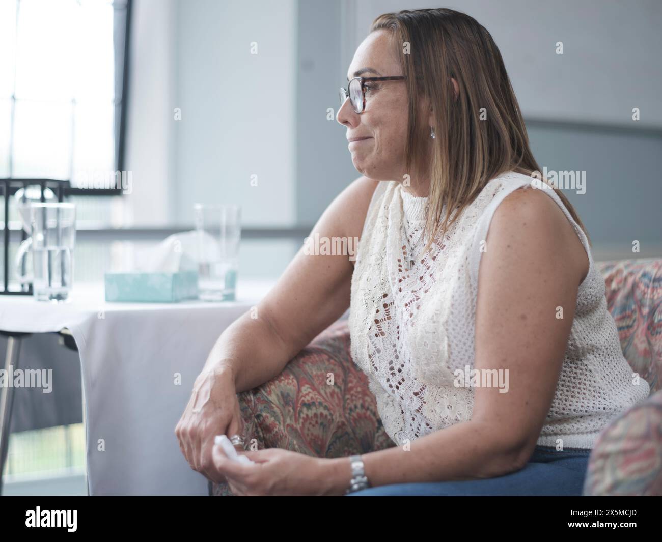 Paziente pianto durante la sessione di terapia Foto Stock