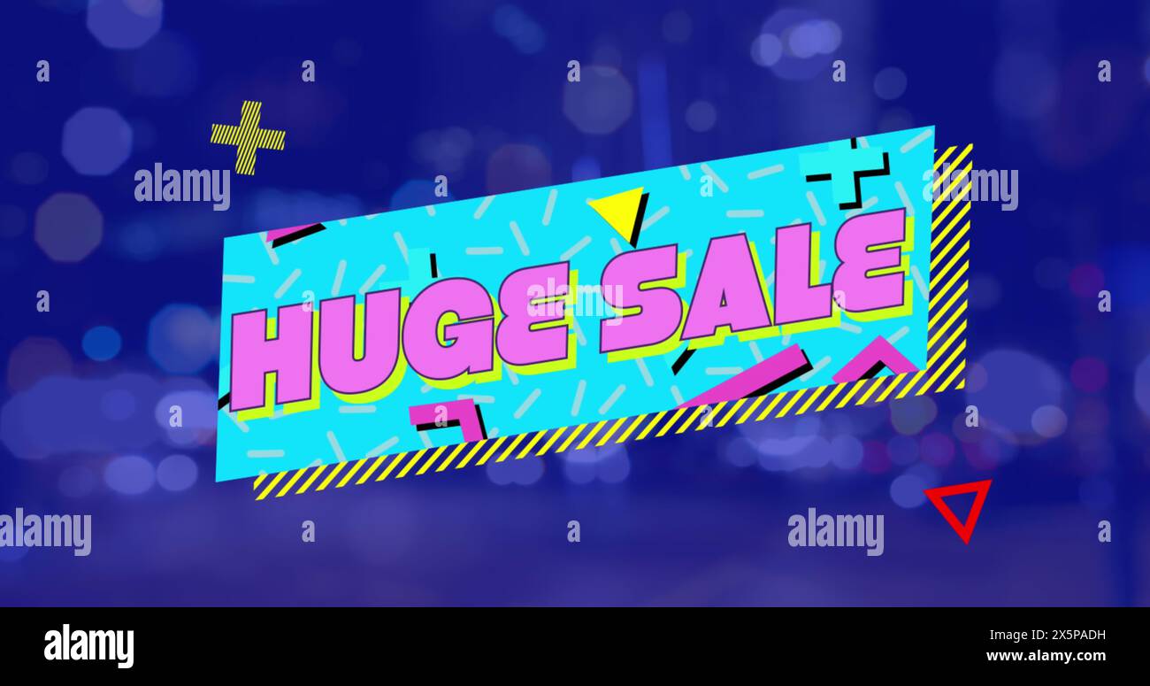 I colori brillanti e le lettere in grassetto annunciano un'enorme vendita su uno sfondo sfocato Foto Stock