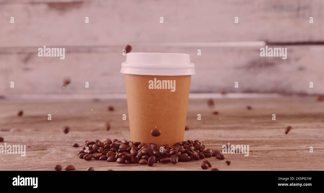 Immagine di macchie bianche che si muovono sui chicchi di caffè che cadono sul caffè da asporto Foto Stock