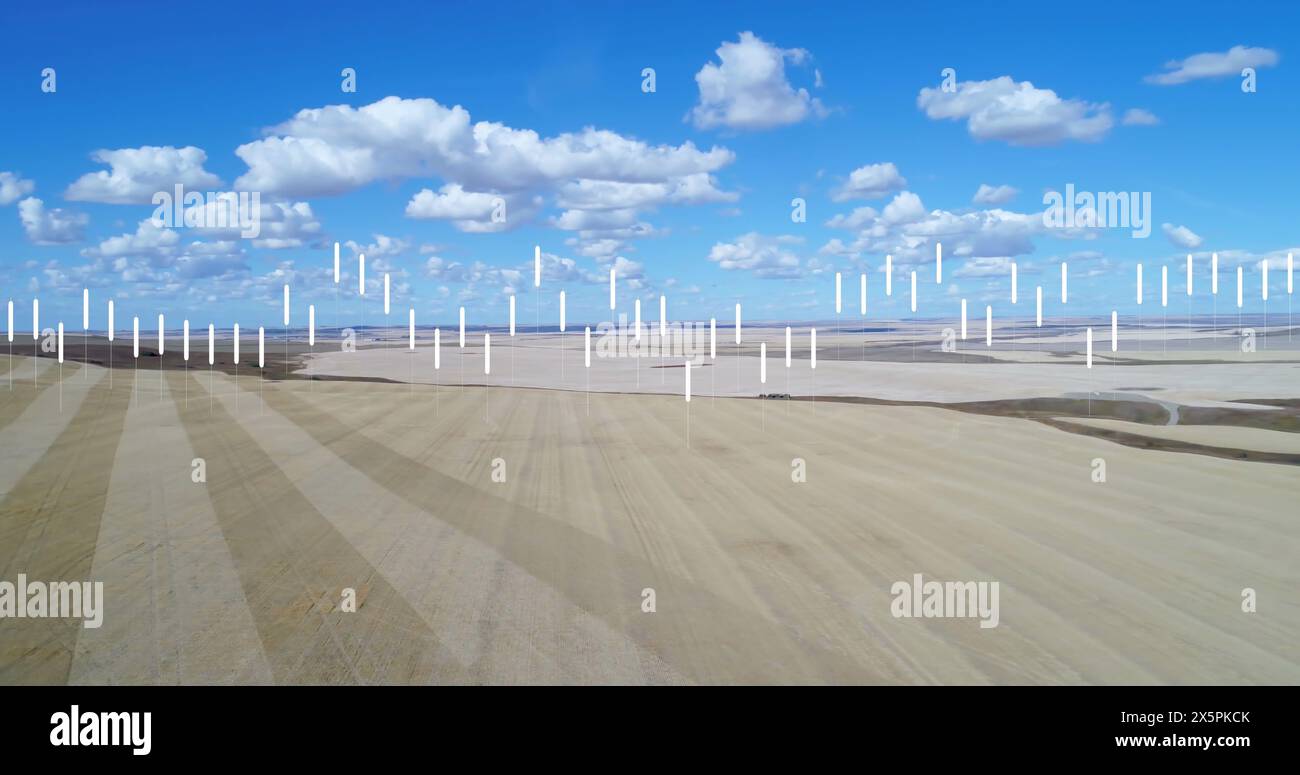 Immagine dell'elaborazione dei dati sul paesaggio con terra arida e nuvole nel cielo blu Foto Stock