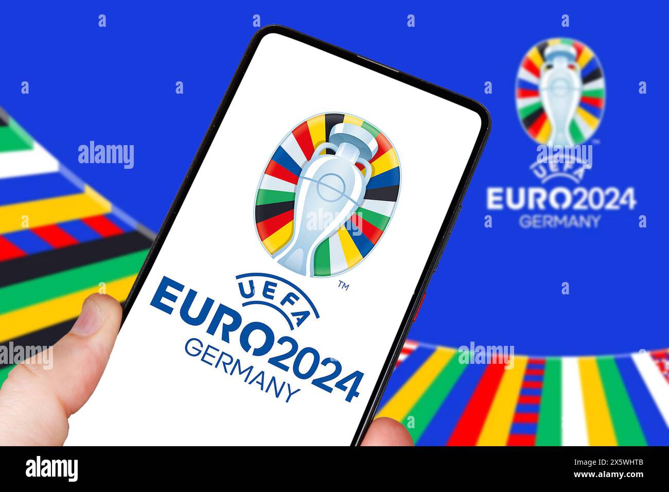 Germania - 1 maggio 2024: Logo UEFA Euro 2024 Germany European Football Championship Europe su un fotomontaggio mobile in Germania. Foto Stock
