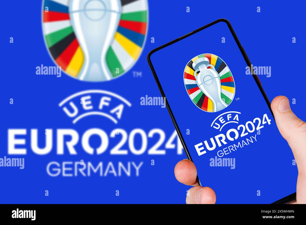 Germania - 1 maggio 2024: Logo UEFA Euro 2024 Germany European Football Championship Europe su un fotomontaggio mobile in Germania. Foto Stock