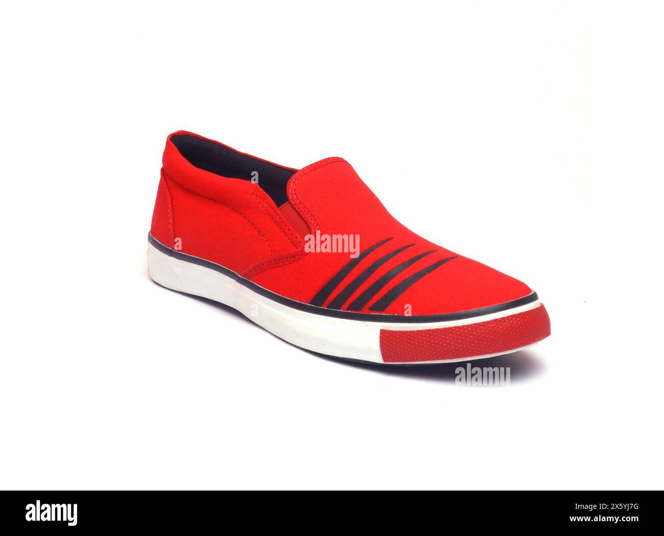 sneaker in tela rossa e bianca isolate Foto Stock