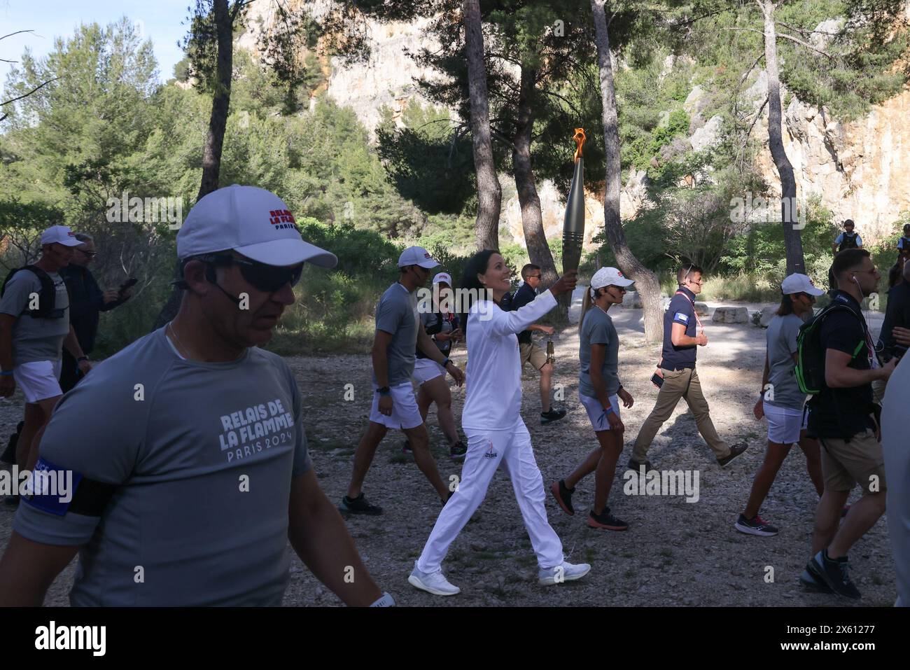 Cassis, Francia. 12 maggio 2024. Sylvain Rostaing/le Pictorium - staffetta torcia olimpica a Cassis e Port Miou - 12/05/2024 - Francia/Provence-Alpes-Cote d'Azur/Cassis - i relè torcia olimpica nelle vicinanze di Cassis. 12 maggio 2024. Crediti: LE PICTORIUM/Alamy Live News Foto Stock