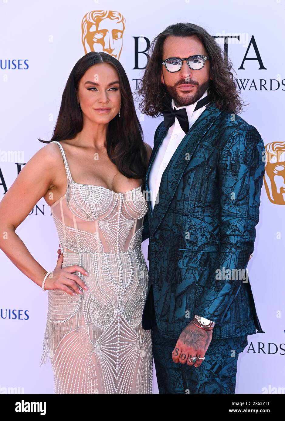 Londra, Regno Unito. 12 maggio 2024. Vicky Pattison e Joe Wicks arrivano ai BAFTA Television Awards 2024, Royal Festival Hall. Crediti: Doug Peters/EMPICS/Alamy Live News Foto Stock