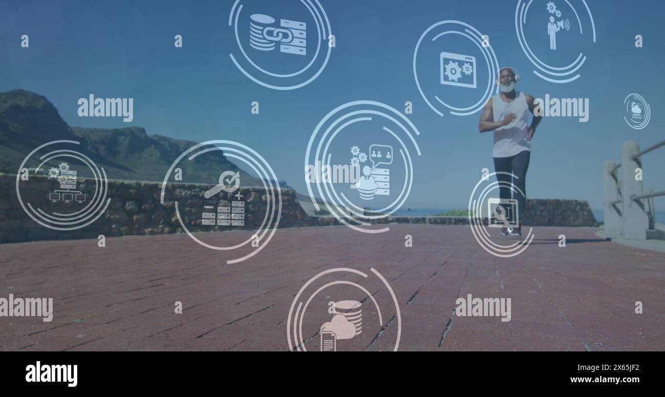 Immagine di icone dei media su un anziano uomo afroamericano che corre in spiaggia Foto Stock