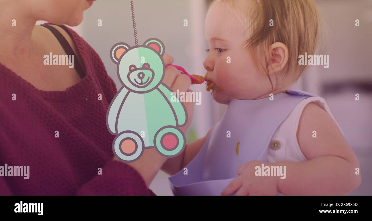 Immagine dell'icona dell'orsacchiotto sulla madre caucasica che dà da mangiare al bambino con un cucchiaio Foto Stock