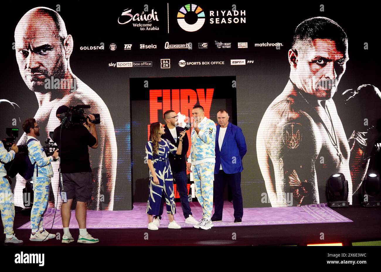 Presentatore Ali Drew e Oleksandr Usyk durante i grandi arrivi cerimoniali al Boulevard City Music World, Riyadh, Arabia Saudita. Sabato 18 maggio si svolgerà la lotta per il titolo IBF, WBA, WBC e WBO tra Tyson Fury e Oleksandr Usyk. Data foto: Martedì 14 maggio 2024. Foto Stock