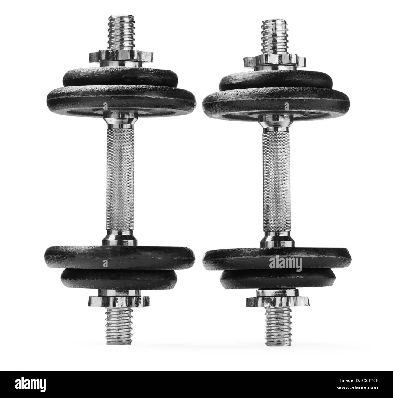 Manubri in metallo isolati su bianco. Attrezzature sportive Foto Stock