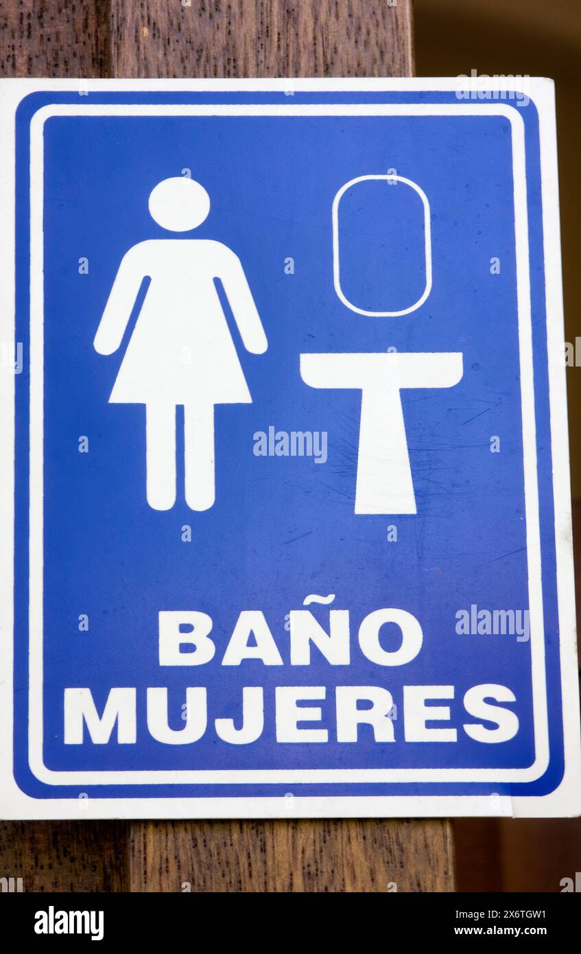 Oaxaca, Messico, Nord America. Firma per il bagno delle donne. Foto Stock