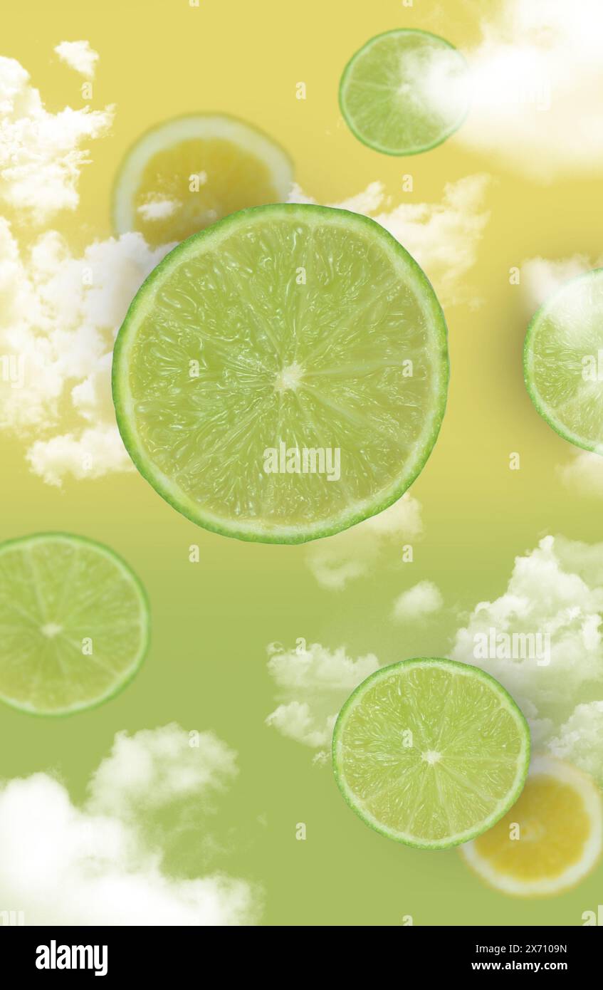 Agrumi volanti, astrazione: limoni e limoni su sfondo verde e giallo con nuvole Foto Stock