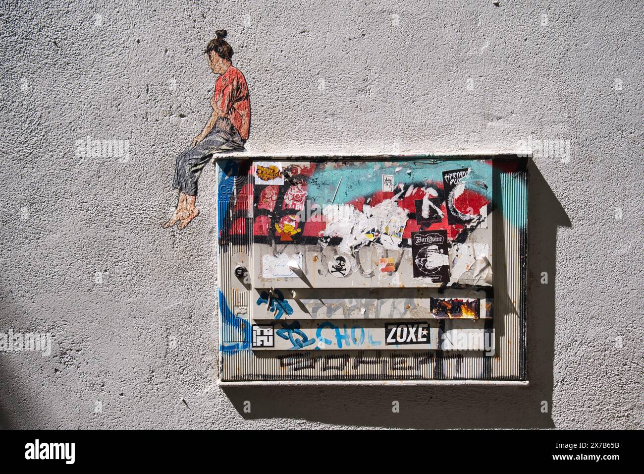 Piccoli graffiti su un muro a Madrid Foto Stock
