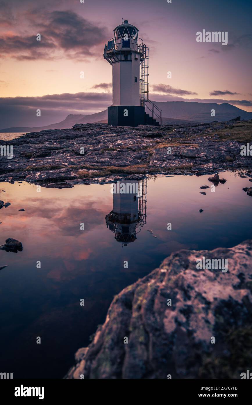 Rhue faro al tramonto Foto Stock