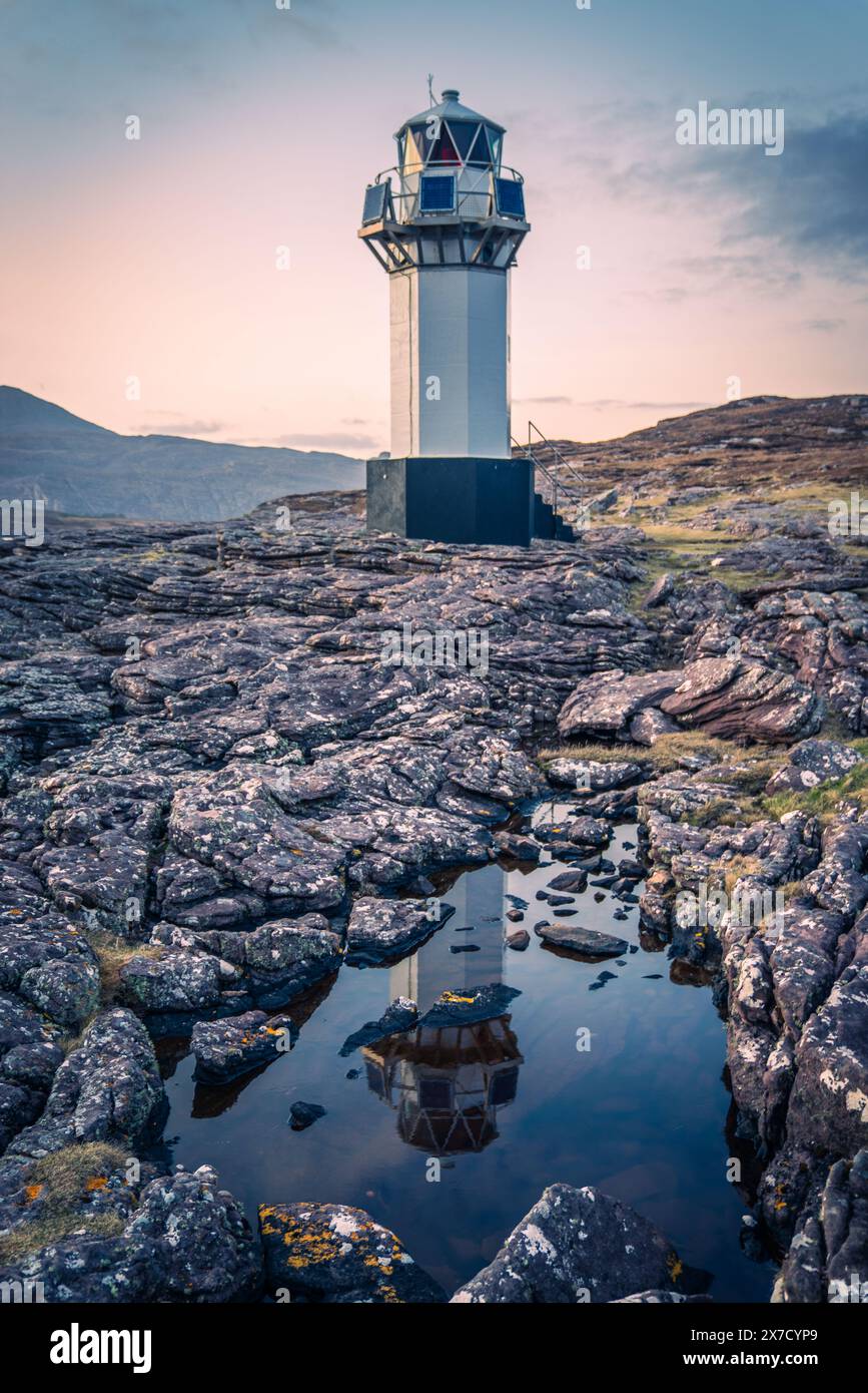 Rhue faro al tramonto Foto Stock