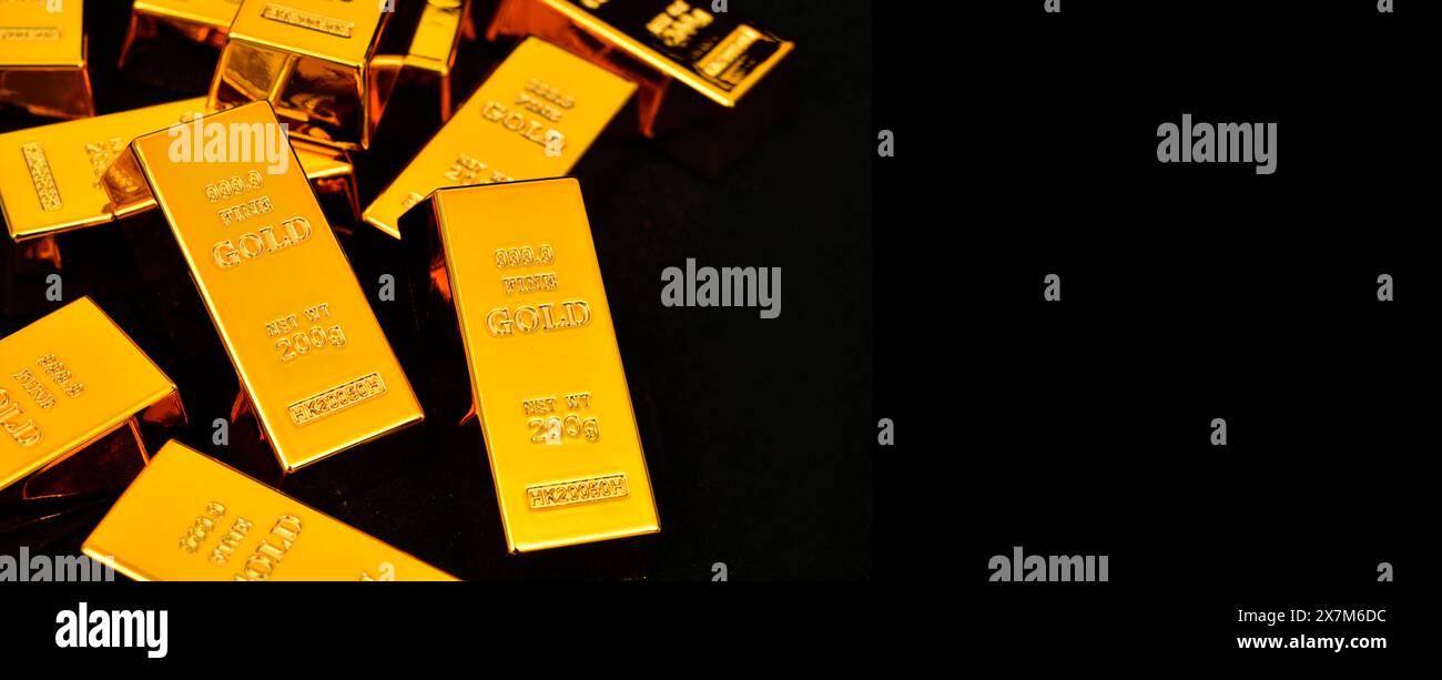 Primo piano Gold Bars su sfondo nero, concetto di successo nel business e nella finanza Foto Stock