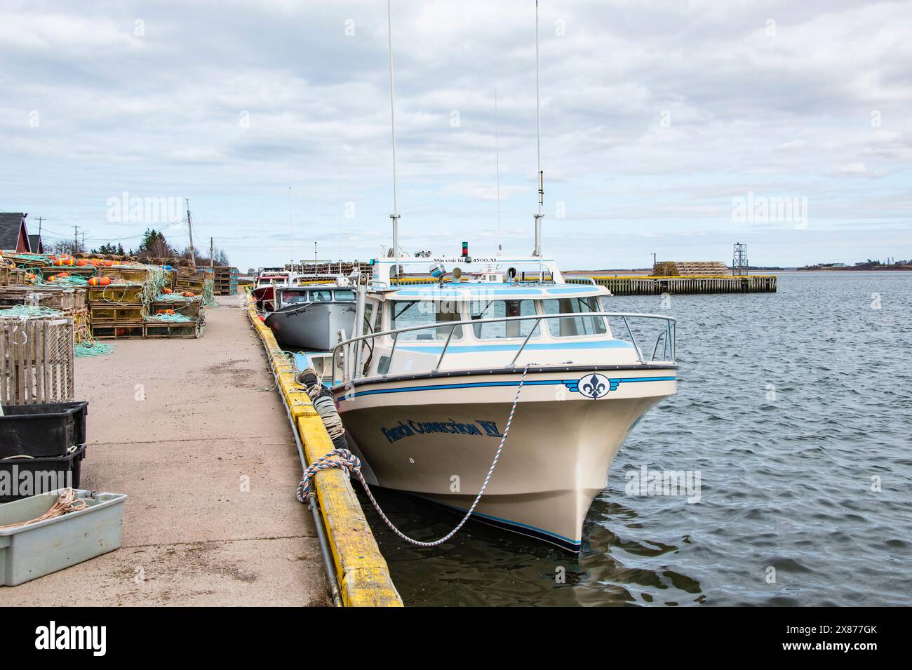 Barche ancorate al molo di North Rustico, Prince Edward Island, Canada Foto Stock