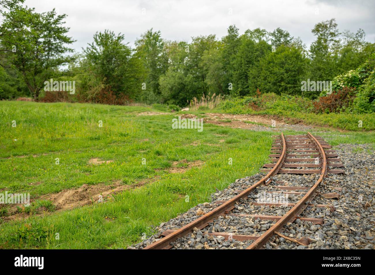 fine della linea vecchia e arrugginita ferrovia, riabilitata per il turismo Foto Stock