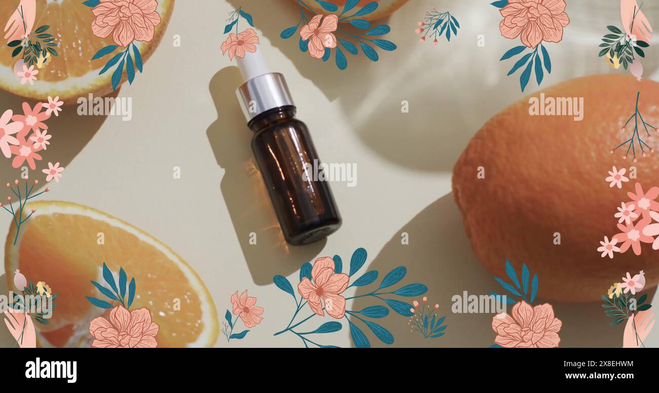 Immagine di una cornice di fiori con bottiglia marrone, arance e spazio di copia su sfondo bianco Foto Stock