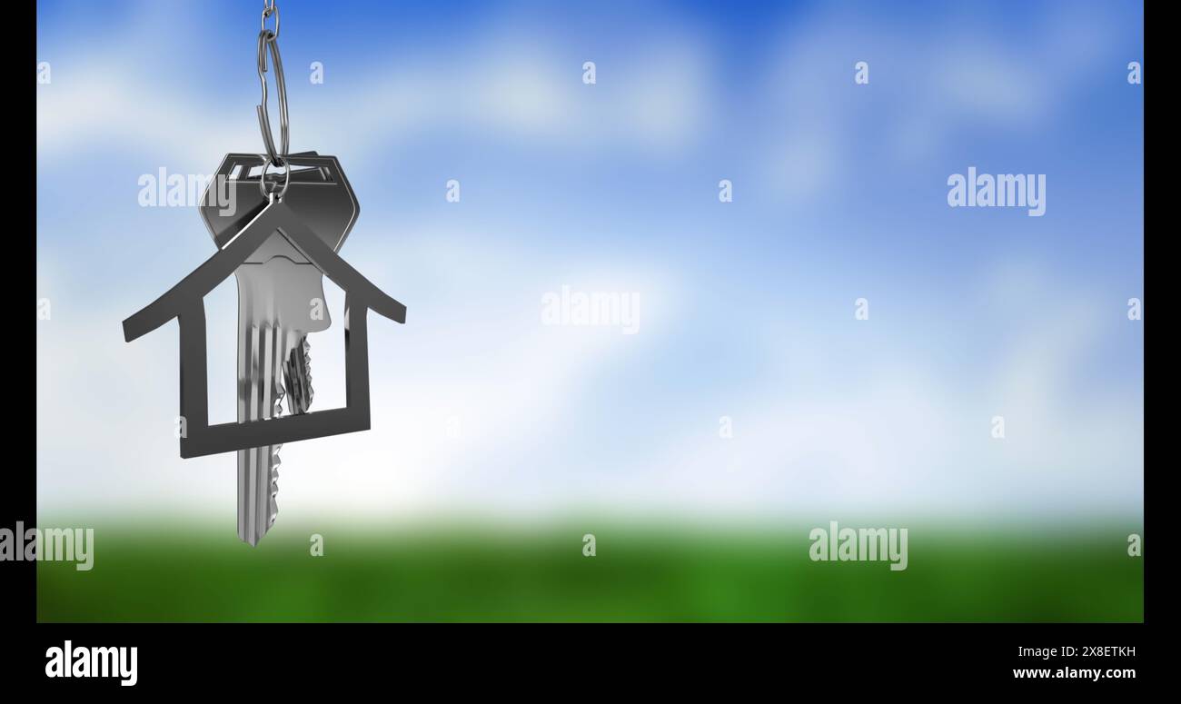 Immagine della chiave con portachiavi della casa su sfondo sfocato Foto Stock