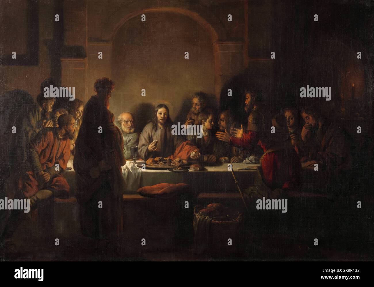 Paesi Bassi: 'L'ultima cena'. Dipinto a olio su tela di Gerbrand van den Eeckhout (19 agosto 1621 - 29 settembre 1674), 1664. Van den Eeckhout era uno studente di Rembrandt e, come il suo mentore, preferiva usare colori scuri e contrasti con la luce. In questo capolavoro, egli mostra Gesù Cristo al centro, illuminato da candele e da un alone. Gesù spezza il pane per condividere con i suoi discepoli che sembrano ansiosi e profondi nella discussione. Essi sono vessati perché Cristo ha appena dichiarato che uno di loro lo tradisce. Gesù sembra avere uno sguardo a Giuda, che si trova in primo piano. Foto Stock