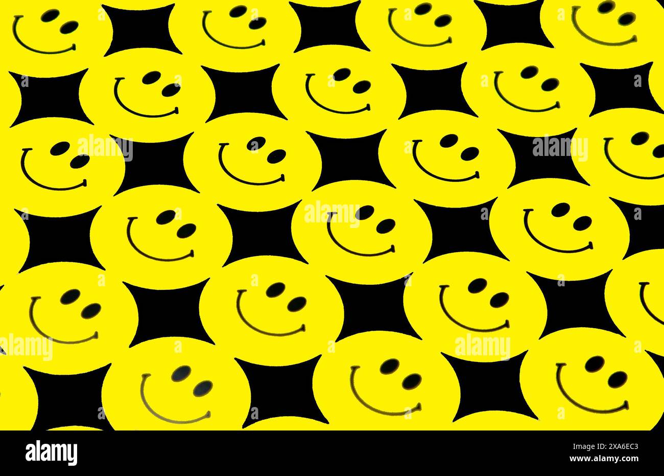 Molti sorrisi gialli su sfondo nero Foto Stock
