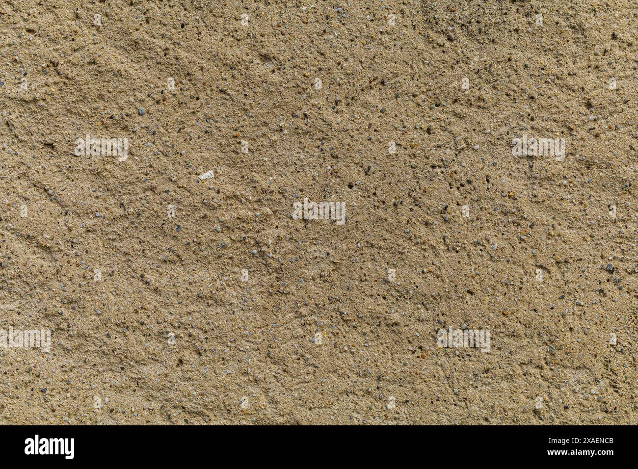 fotografie piatte di una superficie di arenaria di colore giallo beige, sfondo naturale di sabbia ruvida Foto Stock