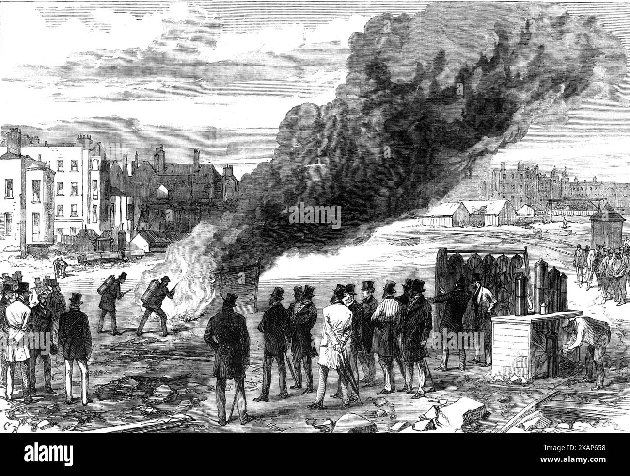 Esperimenti con l'Extincteur sul Thames Embankment [a Londra] prima del Principe di Galles, 1868. "Il Principe e il Duca di Sutherland sono noti per avere un particolare interesse nell'organizzazione e nell'azione di tutti i mezzi per estinguere gli incendi. Ultimamente hanno rivolto la loro attenzione al motore antincendio portatile brevettato di Dick, chiamato "l'Extincteur"... sono state allestite tre strutture temporanee... la prima era... piena di catrame e nafta; la seconda era... piena di una dozzina di catrame e altre botti, legna da ardere e trucioli; la terza rappresentava tre lati di un falegname Foto Stock